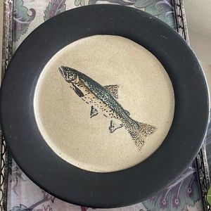 Hand stenciled stoneware decorative plates.